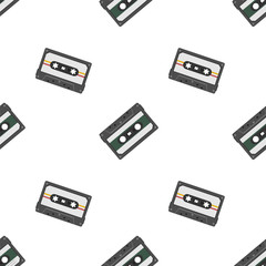 Fototapeta premium Retro seamless background with audio tapes. Magnetic audiotapes tileable pattern