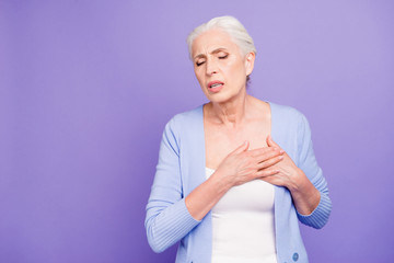 Gray haired old beautiful caucasian woman wearing casual sufferi