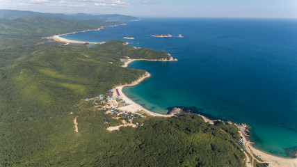 Fototapeta na wymiar Drone aerial view from above on beautiful blue water bay on sunny day