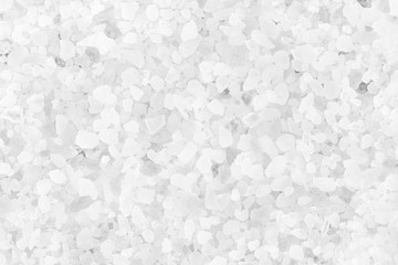 White background made of crystals of Himalayan salt. Top view