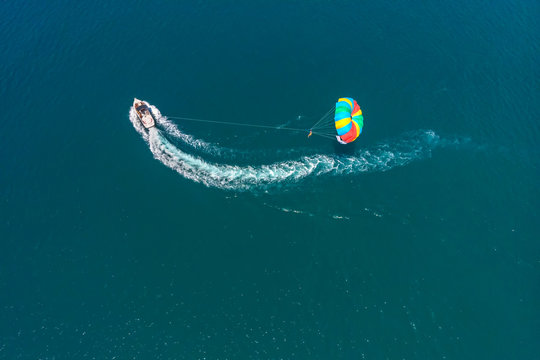 Aerial view of the boat and parachute in the sea