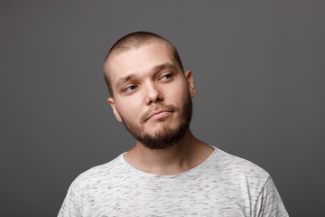 the portrait of the young bearded man