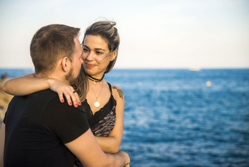 Fototapeta na wymiar Romantic couple by the sea