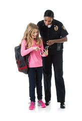 Fototapeta premium Police: Policewoman And Child Discuss Online Safety