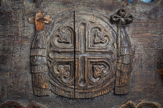Antique wood carving art at ancient temple door