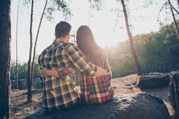Rear back view of two people, happy romantic couple in love, wea