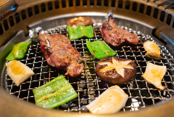 Yakiniku Japanese bbq with meat and vegetables cooking