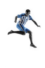 Fototapeta na wymiar Professional football soccer player in action or movement isolated on white studio background