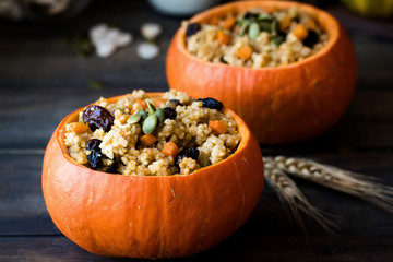 Millet porridge with raisins in pumpkin