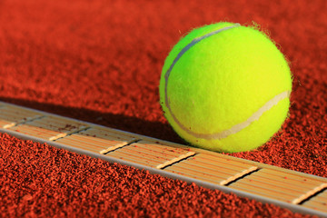 Tennis balls on a tennis clay court © Željko Radojko