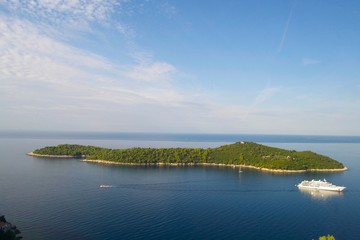 Lokrum the Cursed Island near Dubrovnik in Croatia with Luxury yacht in background
