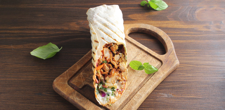 shaurma kebab on a wooden background