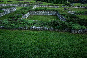 excavations ancient unknown ruins concept on grass nature green environment with empty space for...