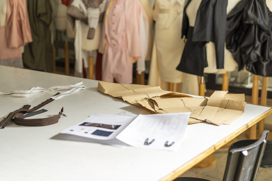 Sewing items on working table in a fashion designer's studio