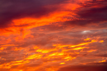 colorful dramatic sky with cloud at sunset..