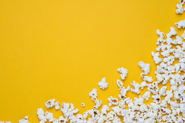 popcorn on a yellow - obrazy, fototapety, plakaty