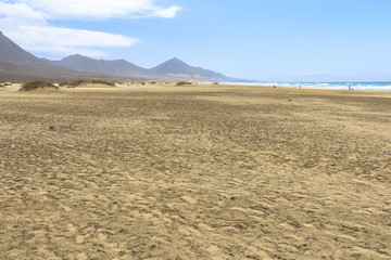 Wide sandy beach landscape of Cofete beach, Fuerteventura