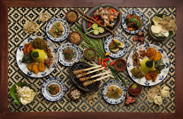 Freshly prepared delicious varieties of dishes on table. Many food dishes on table