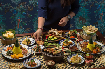 Freshly prepared delicious varieties of dishes on table. Many food dishes on table