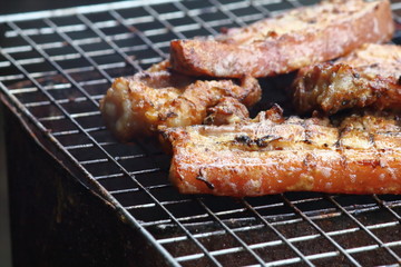 delicious food pork grilling on hot charcoal