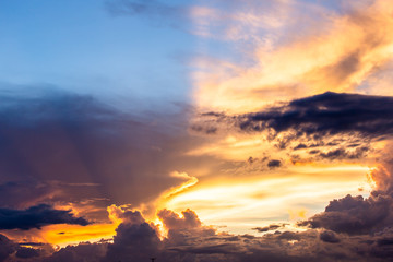 colorful dramatic sky with cloud at sunset.