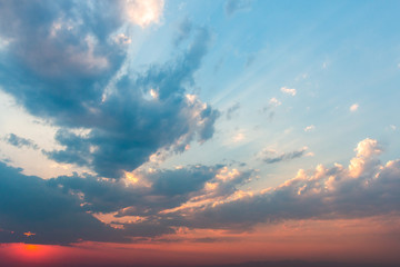 Naklejka na ściany i meble colorful dramatic sky with cloud at sunset..