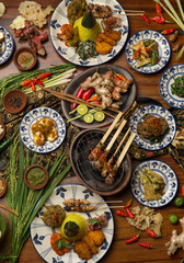 Freshly prepared delicious varieties of dishes on table. Many food dishes on table
