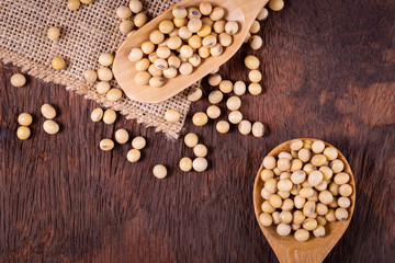 Soybean oil on a wooden background. rustic style