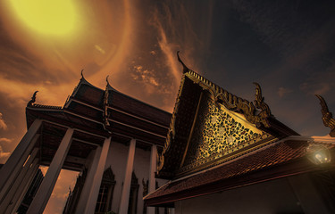 Fototapeta na wymiar Sun halo over Buddhist Temple