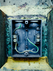 Fototapeta na wymiar Aged fuse panel with switch box