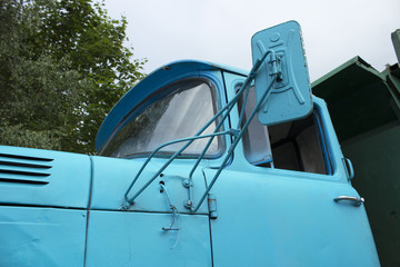 Fototapeta na wymiar Cabin of an old Soviet truck with a mirror