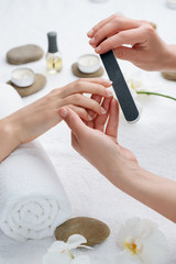 Treatment for nails at the SPA salon. Distressing procedure that gives your hands a fresh and beautiful look.