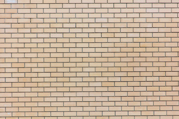 Yellow bricks in the wall as an abstract background