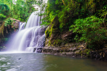 Fototapeta na wymiar Tropical deep forest Klong Chao waterfall in Koh Kood island
