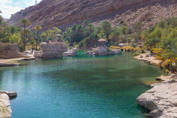 Fototapeta na wymiar Emerald pools in Wadi Bani Khalid, Oman .