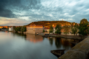 The first morning sun on the roofs of old Prague