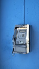 Fototapeta na wymiar An old telephone on the street of Havana city, Cuba 