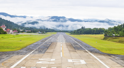 Mae Hong Son, Thailand July 18, 2018 : Airport runway in the morning sunrise time.