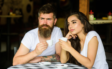 Couple enjoy hot espresso. Morning coffee tradition. Dreamy mood. Take a break to enjoy coffee and dream about pleasant things. Enjoy every moment. Couple drink black espresso coffee in cafe