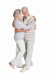 Portrait of a cute senior couple hugging