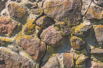 the ancient stone wall of the castle