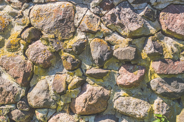 the ancient stone wall of the castle