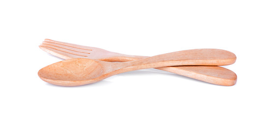 wooden spoon and fork on white background.