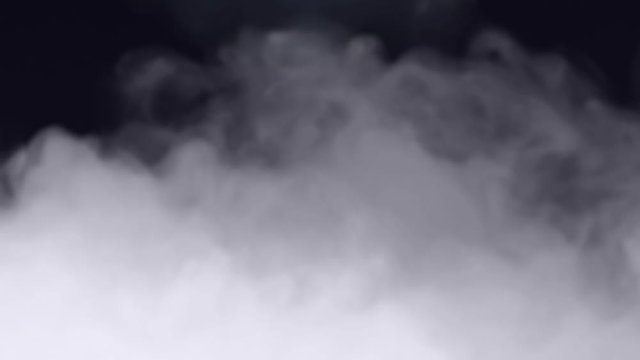 Smoke floating on black background. Haze animation
