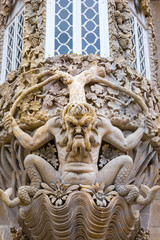 Fototapeta na wymiar Gargoyle in the Pena Castle, Sintra, Portugal