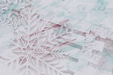 Abstract blurred festive Christmas background with decoration snowflakes in light pink blue colors