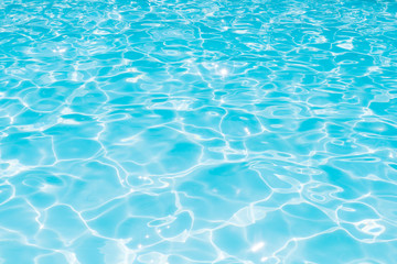 Naklejka na ściany i meble Blue and bright water in swimming pool with sun reflection, Motion of ripple water and gentle wave in pool