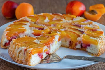 Apricot pie on a white plate.