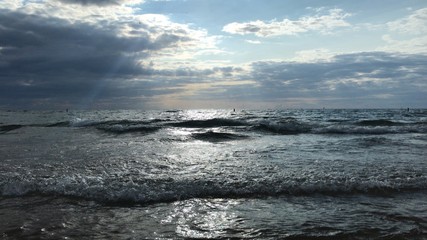 Family Plays On The Beach