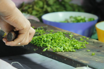 chopping green chilli